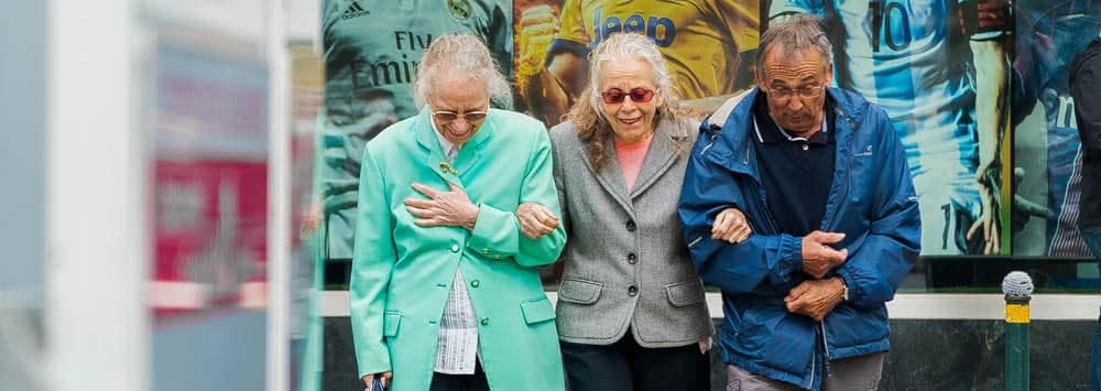 Elderly diverse group of people supporting each other, highlighting frailty and ethnicity issues in aging.
